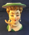Velco 5" Lady Head Vase W Earrings, Pearls, Green Hat 2747