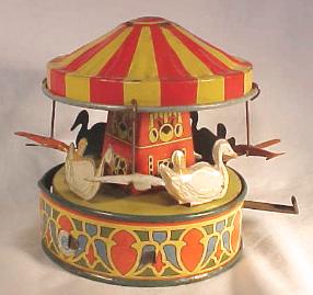 Tin Windup Toy: Carousel and airplane ride